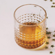 whiskey glass on table